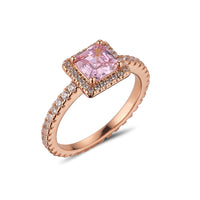 R126RTR Beautiful classic style ring embellished with CZ stones and pink centre stone. Rose gold plating.